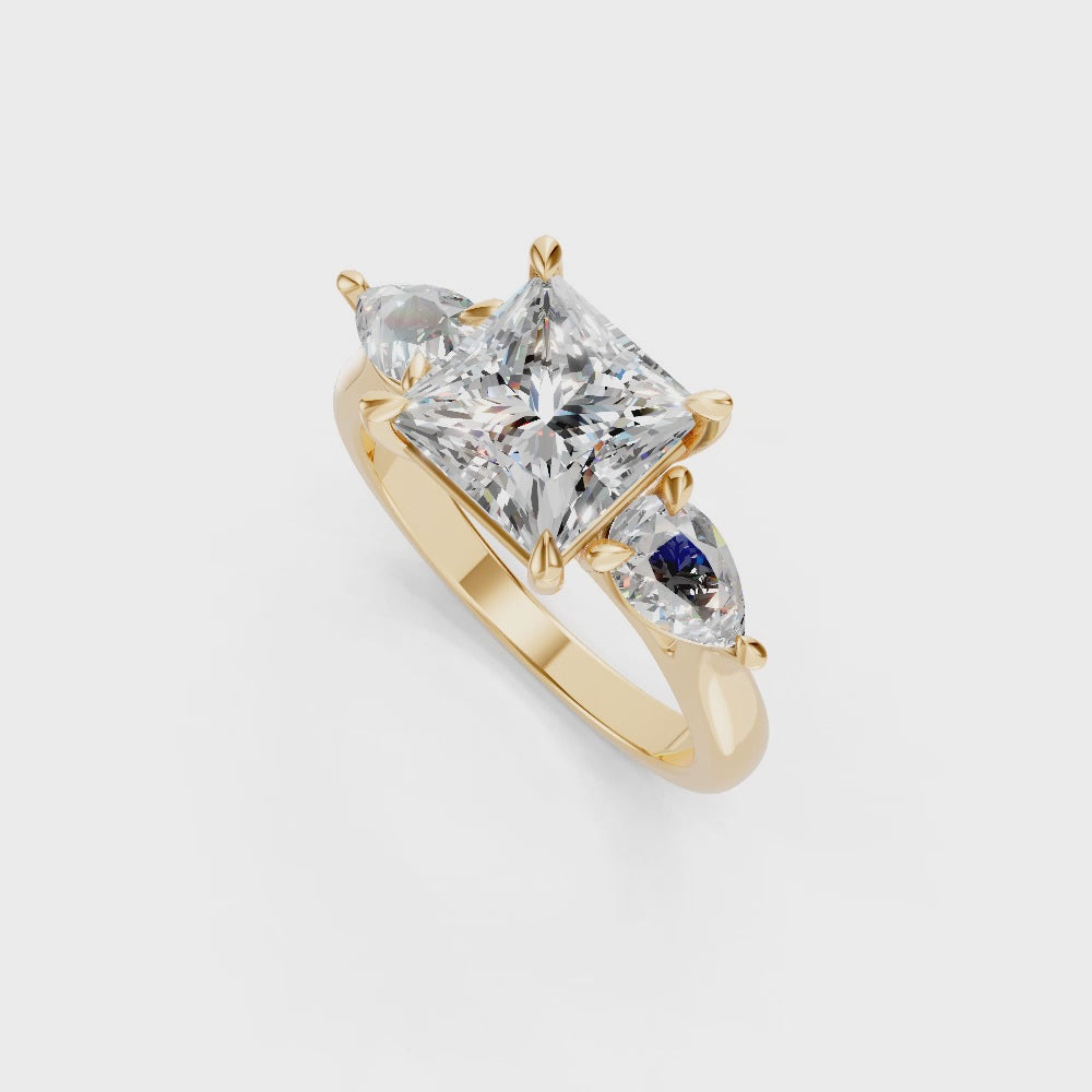 9ct Yellow Gold Ring set with Princess & Pear cut Diamonds