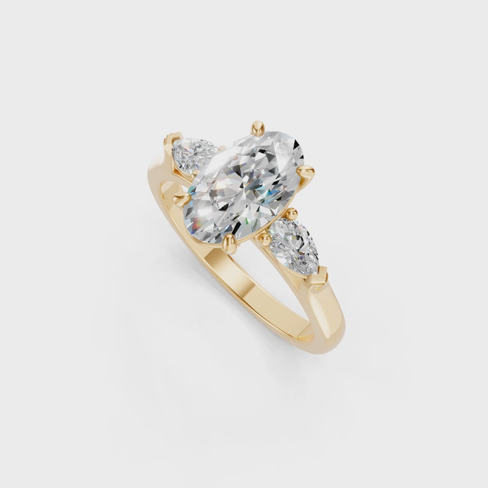 9ct Yellow Gold Trilogy Ring set with Oval & Pear cut Diamonds